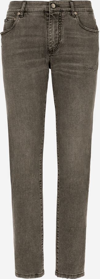 Slim fit stretch denim jeans with subtle abrasions